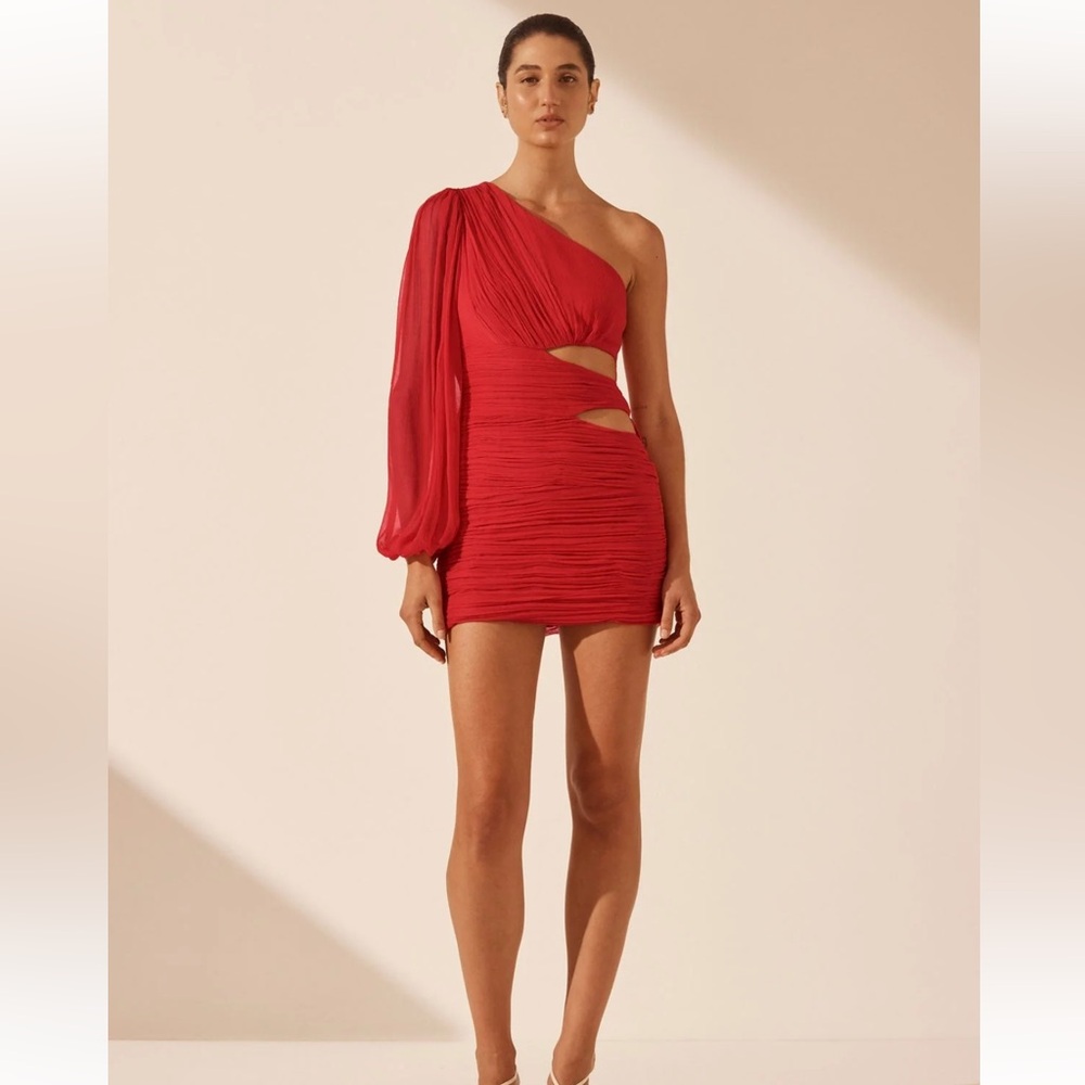 Robe Shona Joy jamais portée
Tissu, coupe et couleur absolument magnifiques